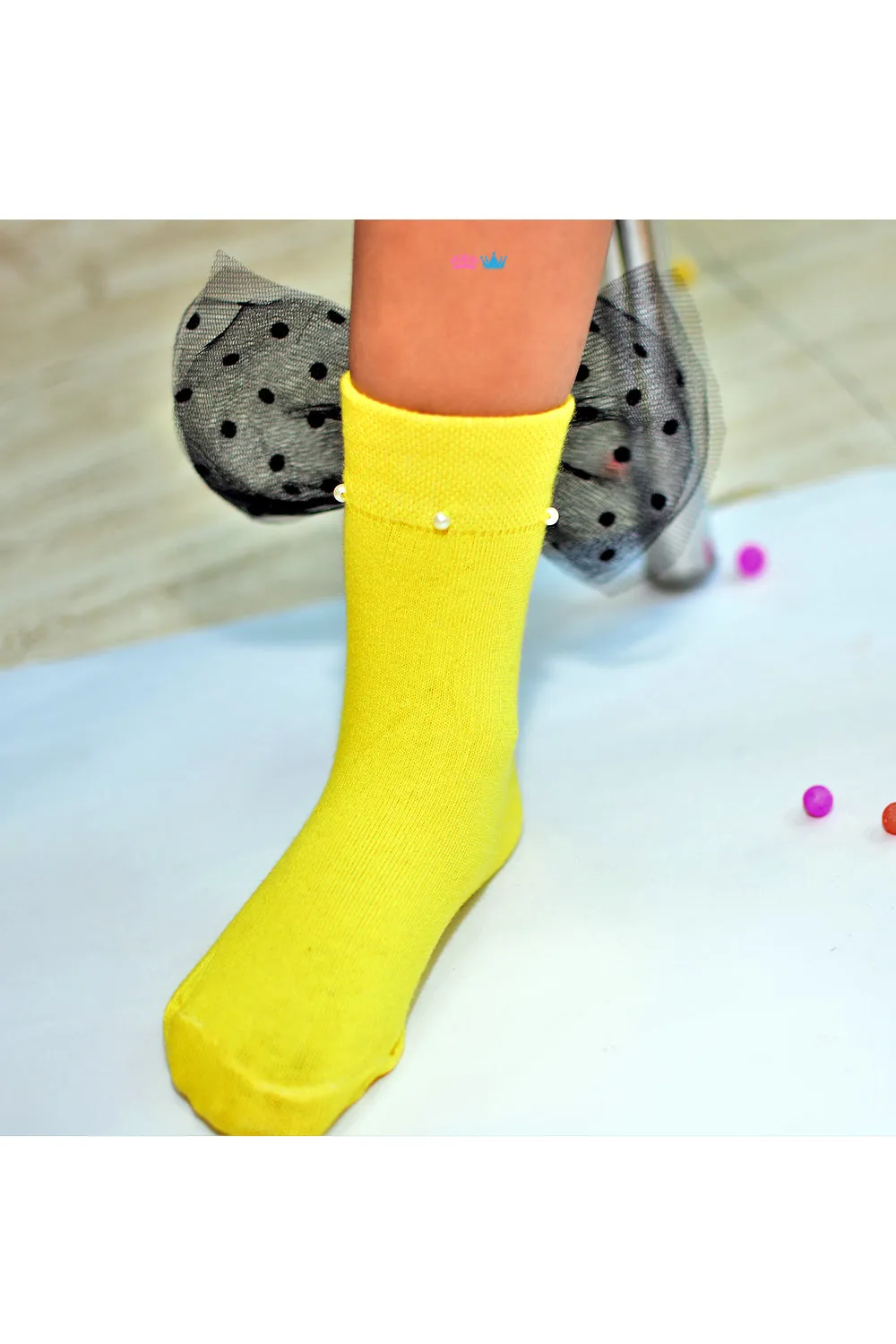 Yellow embellished black bow socks